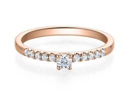 brillant  solitar mit seitlichem besatz rotgold